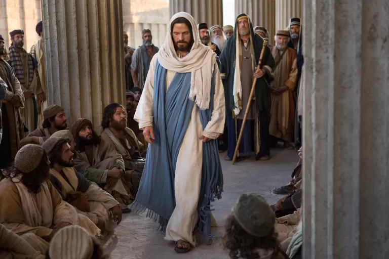 Jesus teaches Pharisees as they question Him.