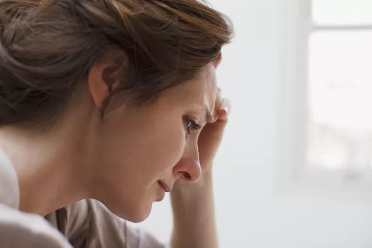 A woman mourns a loved one