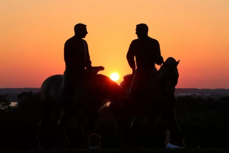 Two Men on Horseback